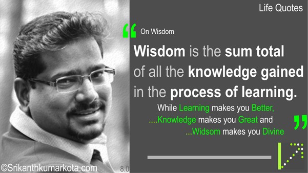 Business colleagues having an informal meeting, discussing work and laughing while using a laptop on a comfortable lounge couch